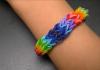 Rubber bracelets on a small loom Rubber bracelets on a monster tail loom